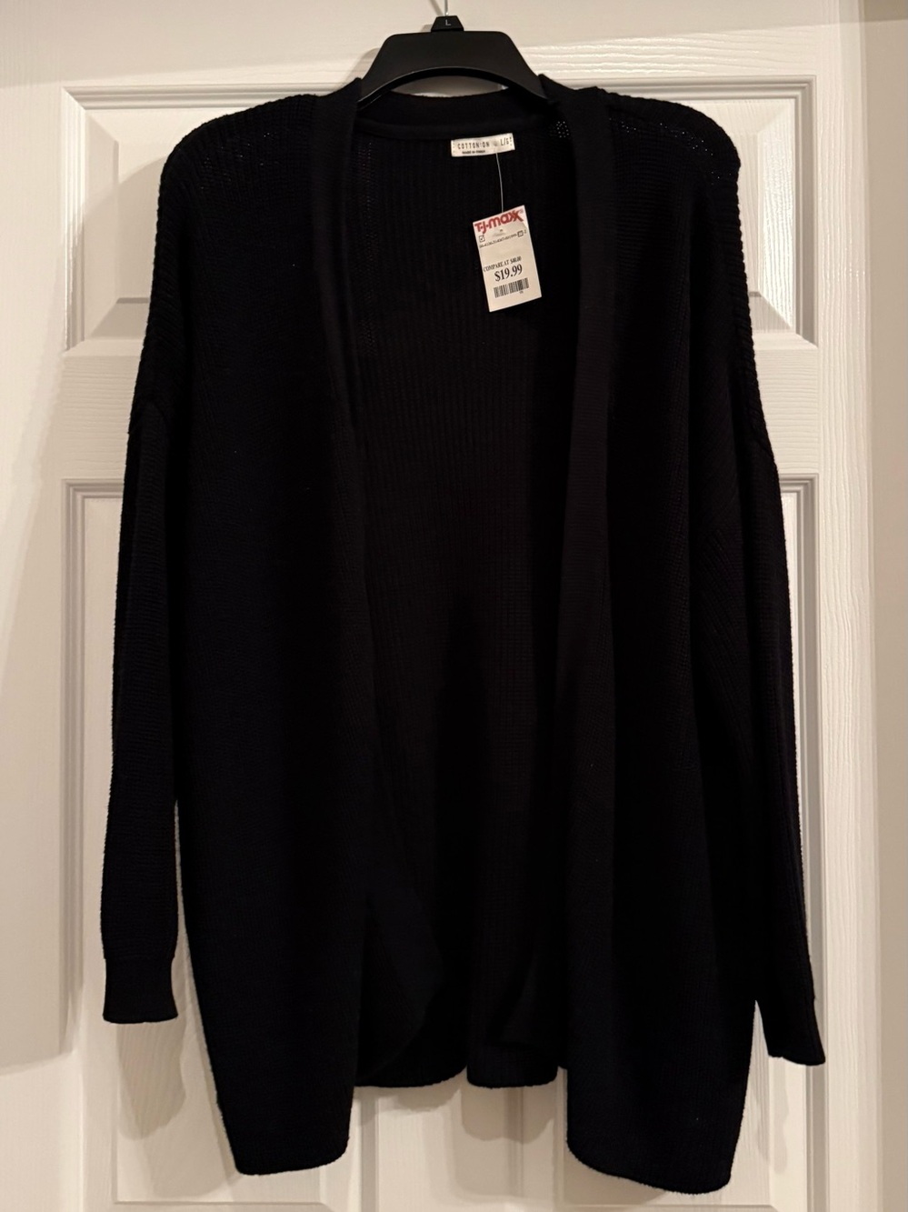 Beautiful Women’s Cotton:On black knitted cardigan. Size large. New with tag.